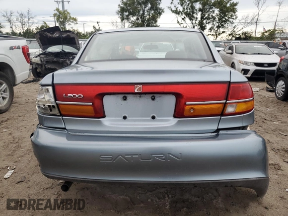 2002 Saturn LS z VIN 1G8JU54F82Y567169, wystawiony jako Copart lot #73280794 z przebiegiem 53 894 mil mil oraz Szkody całkowita. Historia ofert i sprzedaży dostępna na DreamBid. Obrazek 6.