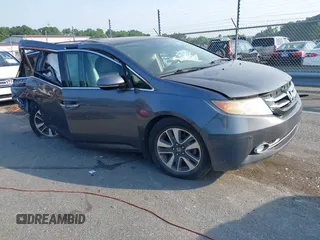 2016 Honda Odyssey Touring Elite with VIN 5FNRL5H95GB142600, listed as a IAAI auction lot 42580691 with 162,408 mi miles and . Bid and sale history available at DreamBid. Image 1.