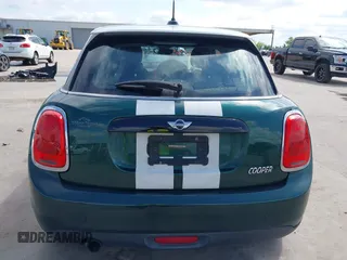 2016 MINI Hardtop 4 Door with VIN WMWXU1C52G2D10035, listed as a IAAI auction lot 42190544 with 106,383 mi miles and . Bid and sale history available at DreamBid. Image 16.