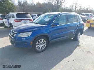 2009 Volkswagen Tiguan S with VIN WVGAV75N19W000288, listed as a IAAI auction lot 41269877 with 119,689 mi miles. Bid and sale history available at carsss.com. Image 17.