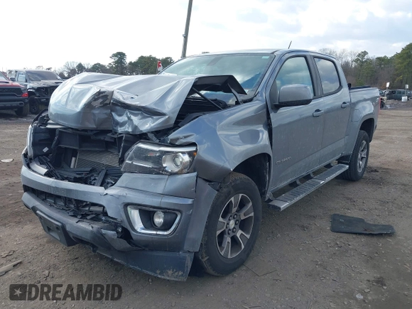 2018 Chevrolet Colorado 4WD Z71 z VIN 1GCGTDENXJ1133572, wystawiony jako IAAI lot #41437941 z przebiegiem 82 254 mil mil oraz . Historia ofert i sprzedaży dostępna na DreamBid. Obrazek 17.