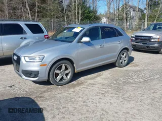 2015 Audi Q3 2.0T Premium Plus with VIN WA1EFCFSXFR010015, listed as a IAAI auction lot 42099410 with 142,117 mi miles. Bid and sale history available at carsss.com. Image 2.
