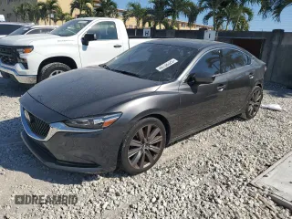 2018 Mazda 6 Grand Touring with VIN JM1GL1TY6J1303258, listed as a Copart auction lot 48738325 with 64,169 mi miles and Salvage Title. Bid and sale history available at DreamBid. Image 1.