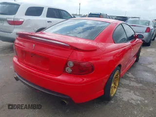 2005 Pontiac GTO with VIN 6G2VX12U85L372125, listed as a IAAI auction lot 41713551 with 149,103 mi miles. Bid and sale history available at carsss.com. Image 4.