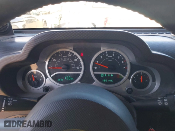2008 Jeep Wrangler Sahara with VIN 1J4FA54108L543764, listed as a IAAI auction lot 41867734 with 186,145 mi miles and . Bid and sale history available at DreamBid. Image 7.