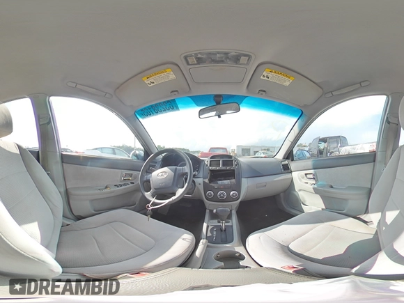 2007 Kia Spectra EX with VIN KNAFE121075394066, listed as a Copart auction lot 63238165 with 234,287 mi miles and Salvage title. Bid and sale history available at DreamBid. Image 14.