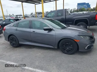2020 Honda Civic LX with VIN 2HGFC2F63LH530442, listed as a IAAI auction lot 42071650 with 38,520 mi miles and . Bid and sale history available at DreamBid. Image 13.