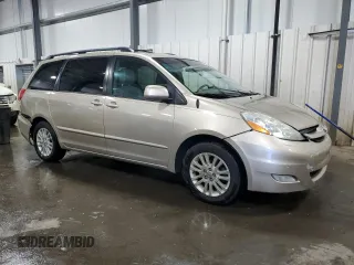 2010 Toyota Sienna XLE with VIN 5TDYK4CC9AS297214, listed as a Copart auction lot 58168805 with 166,970 mi miles and Salvage title. Bid and sale history available at DreamBid. Image 4.