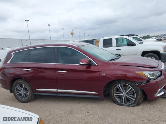 2019 Infiniti QX60 PURE with VIN 5N1DL0MM7KC558351, listed as a IAAI auction lot 41685778 with 100,949 mi miles. Bid and sale history available at carsss.com. Image 13.
