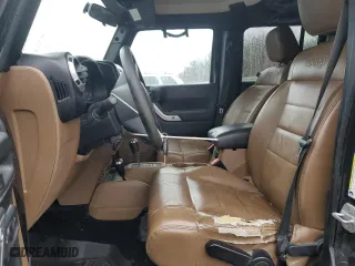 2012 Jeep Wrangler Unlimited Sahara with VIN 1C4HJWEG0CL163310, listed as a Copart auction lot 48972825 with 125,934 mi miles and Salvage Title. Bid and sale history available at carsss.com. Image 7.