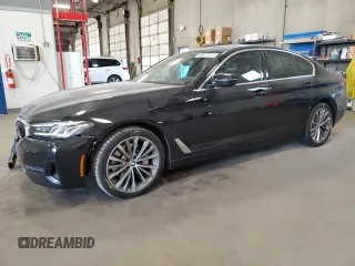 2021 BMW 5 Series 530i xDrive with VIN WBA13BJ01MCF15454, listed as a Copart auction lot 56922345 with 115,667 mi miles and Salvage title. Bid and sale history available at DreamBid. Image 1.
