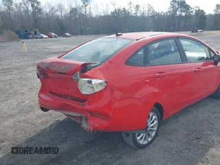 2014 Ford Fiesta SE with VIN 3FADP4BJ8EM170837, listed as a IAAI auction lot 41656071 with 128,334 mi miles and . Bid and sale history available at DreamBid. Image 6.