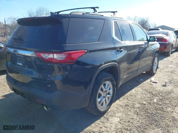 2019 Chevrolet Traverse LT Cloth with VIN 1GNEVGKW2KJ135213, listed as a IAAI auction lot 41293389 with 102,217 mi miles. Bid and sale history available at carsss.com. Image 4.