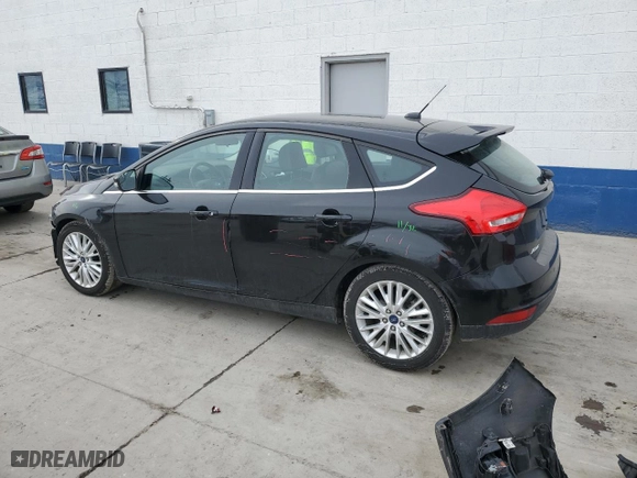 2015 Ford Focus Titanium with VIN 1FADP3N28FL234988, listed as a Copart auction lot 45776425 with 72,307 mi miles and Salvage Title. Bid and sale history available at carsss.com. Image 2.