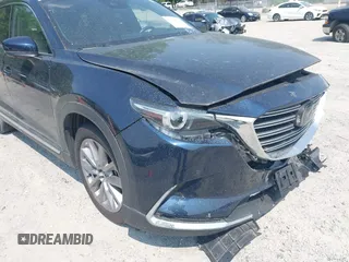 2021 Mazda CX-9 Carbon Edition z VIN JM3TCBDY7M0536005, wystawiony jako IAAI lot #42424129 z przebiegiem 48 005 mil mil oraz . Historia ofert i sprzedaży dostępna na DreamBid. Obrazek 19.