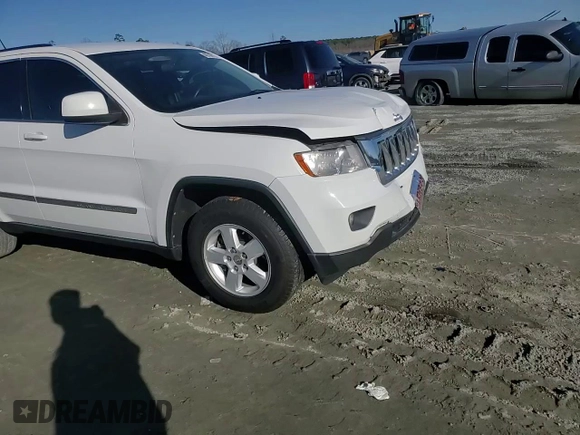 2013 Jeep Grand Cherokee Laredo with VIN 1C4RJEAG0DC636922, listed as a Copart auction lot 48796115 with 151,295 mi miles and Salvage Title. Bid and sale history available at carsss.com. Image 11.