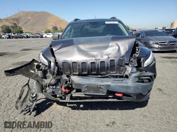 2017 Jeep Cherokee Trailhawk L Plus with VIN 1C4PJMBS4HD237094, listed as a Copart auction lot 61051675 with 104,852 mi miles and Salvage title. Bid and sale history available at DreamBid. Image 5.