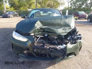 2021 BMW 4 Series 430i with VIN WBA53AP07MCG68388, listed as a IAAI auction lot 42198914 with 14,024 mi miles and . Bid and sale history available at DreamBid. Image 12.