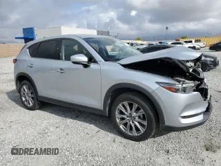 2020 Mazda CX-5 Grand Touring with VIN JM3KFADM5L0732193, listed as a Copart auction lot 51325385 with 86,798 mi miles and Salvage Title. Bid and sale history available at DreamBid. Image 4.