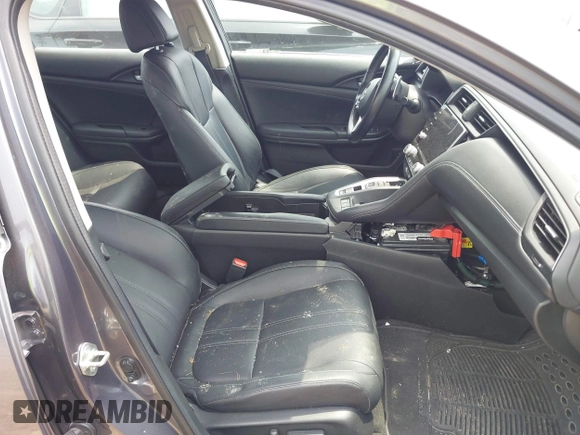 2021 Honda Insight Touring with VIN 19XZE4F97ME001133, listed as a IAAI auction lot 42477281 with 62,394 mi miles and . Bid and sale history available at DreamBid. Image 5.