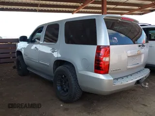 2011 Chevrolet Tahoe LS with VIN 1GNSCAE02BR181767, listed as a IAAI auction lot 42078569 with 212,857 mi miles and . Bid and sale history available at DreamBid. Image 3.