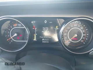 2021 Jeep Wrangler Sport S with VIN 1C4GJXAN0MW647662, listed as a IAAI auction lot 41336264 with 41,612 mi miles and . Bid and sale history available at DreamBid. Image 7.