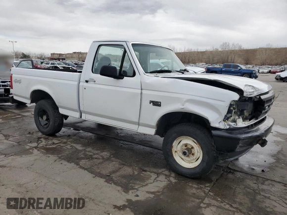 1996 Ford F-150 with VIN 1FTEF14Y2TLA02667, listed as a Copart auction lot 49686735 with 143,197 mi miles and Clean title. Bid and sale history available at DreamBid. Image 4.