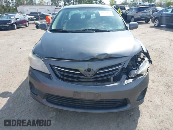 2013 Toyota Corolla L with VIN 2T1BU4EE7DC100830, listed as a IAAI auction lot 42032150 with 205,914 mi miles. Bid and sale history available at carsss.com. Image 12.