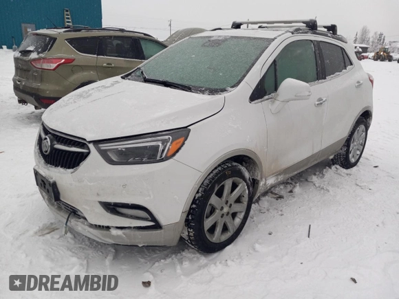 2019 Buick Encore Essence with VIN KL4CJGSM5KB738932, listed as a Copart auction lot 83087444 with 59,162 mi miles and Salvage Title. Bid and sale history available at DreamBid. Image 1.