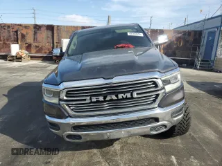 2020 Ram 1500 Laramie with VIN 1C6SRFDT1LN263036, listed as a Copart auction lot 48560655 with 130,923 mi miles and Salvage Title. Bid and sale history available at carsss.com. Image 5.