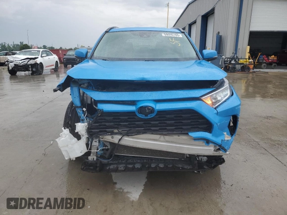 2021 Toyota RAV4 XLE with VIN 2T3P1RFV2MC142047, listed as a Copart auction lot 59095105 with 90,624 mi miles and Salvage title. Bid and sale history available at DreamBid. Image 5.