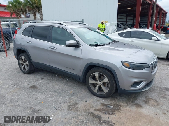 2020 Jeep Cherokee Limited with VIN 1C4PJLDB2LD560723, listed as a IAAI auction lot 41658092 with 73,978 mi miles. Bid and sale history available at carsss.com. Image 1.