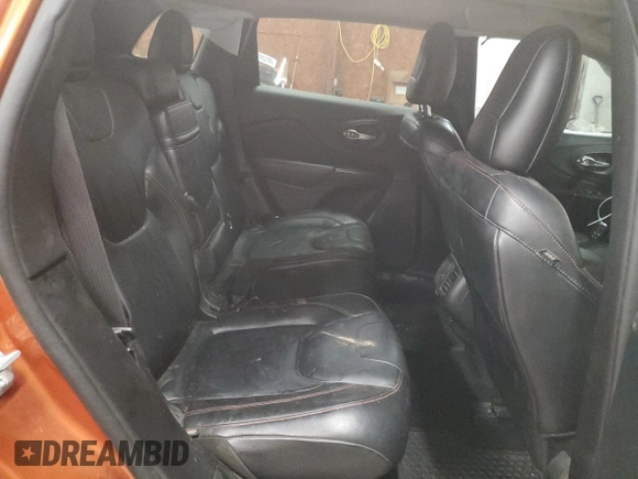 2014 Jeep Cherokee Trailhawk with VIN 1C4PJMBS0EW308775, listed as a Copart auction lot 60465125 with 117,326 mi miles and Salvage title. Bid and sale history available at DreamBid. Image 11.