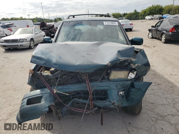 1998 Isuzu Rodeo S with VIN 4S2CM58W8W4368553, listed as a Copart auction lot 71313904 with 183,059 mi miles and Salvage title. Bid and sale history available at DreamBid. Image 5.