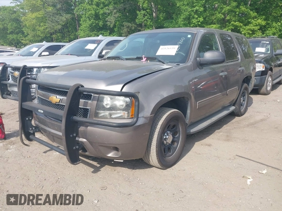 2012 Chevrolet Tahoe Commercial with VIN 1GNLC2E07CR187432, listed as a IAAI auction lot 42126539 with 169,607 mi miles and . Bid and sale history available at DreamBid. Image 17.
