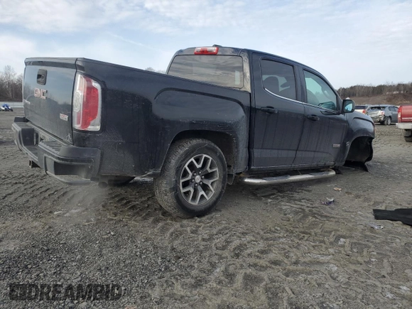 2015 GMC Canyon 4WD SLE with VIN 1GTG6BE34F1165547, listed as a Copart auction lot 43930715 with 124,970 mi miles and Salvage Title. Bid and sale history available at carsss.com. Image 3.