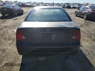 2003 Honda Civic LX with VIN 1HGEM21563L062913, listed as a Copart auction lot 82709824 with 243,989 mi miles and Salvage Title. Bid and sale history available at DreamBid. Image 6.