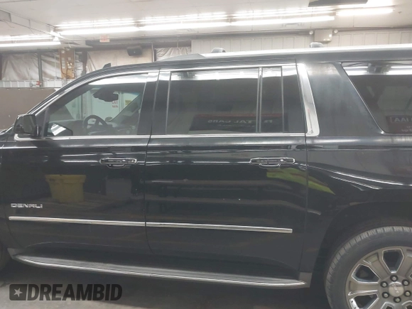 2016 GMC Yukon XL Denali with VIN 1GKS2HKJ8GR102213, listed as a IAAI auction lot 41818737 with 154,607 mi miles and . Bid and sale history available at DreamBid. Image 14.