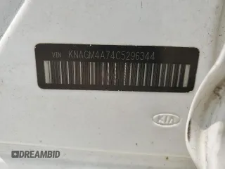 2012 Kia Optima LX z VIN KNAGM4A74C5296344, wystawiony jako Copart lot #58660875 z przebiegiem 151 386 mil mil oraz Szkoda całkowita • Salvage title. Historia ofert i sprzedaży dostępna na DreamBid. Obrazek 12.