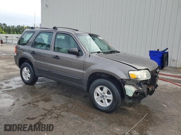 2006 Ford Escape XLS with VIN 1FMYU02Z66KA18952, listed as a Copart auction lot 60472305 with 221,258 mi miles and Salvage title. Bid and sale history available at DreamBid. Image 4.