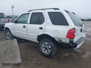 2001 Isuzu Rodeo S with VIN 4S2DM58WX14315138, listed as a IAAI auction lot 41535619 with 217,960 mi miles. Bid and sale history available at carsss.com. Image 3.
