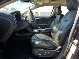 2020 Ford Fusion Titanium z VIN 3FA6P0RU3LR231920, wystawiony jako Copart lot #61643035 z przebiegiem 55 855 mil mil oraz Szkoda całkowita • Salvage title. Historia ofert i sprzedaży dostępna na DreamBid. Obrazek 7.