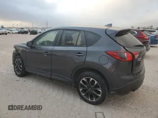 2016 Mazda CX-5 Grand Touring with VIN JM3KE4DY5G0865923, listed as a Copart auction lot 51637115 with 151,174 mi miles and Salvage Title. Bid and sale history available at carsss.com. Image 2.