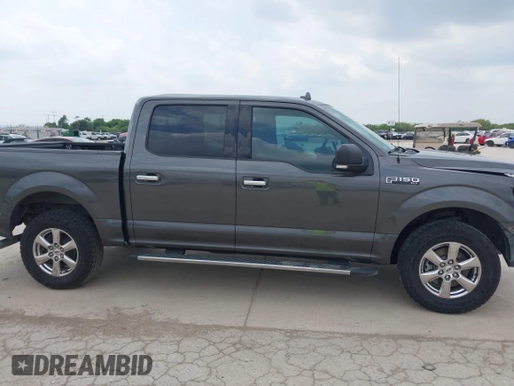 2018 Ford F-150 XL with VIN 1FTEW1EGXJKD18696, listed as a IAAI auction lot 42128458 with 80,811 mi miles and . Bid and sale history available at DreamBid. Image 14.
