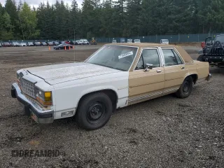 1986 Ford Crown Victoria z VIN 2FABP43F2GX172057, wystawiony jako Copart lot #71609094 z przebiegiem 63 900 mil mil oraz Tytuł czysty. Historia ofert i sprzedaży dostępna na DreamBid. Obrazek 1.