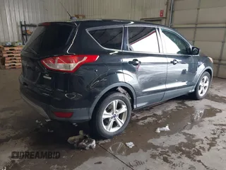2014 Ford Escape SE with VIN 1FMCU0GX4EUC50972, listed as a IAAI auction lot 41953559 with 134,936 mi miles. Bid and sale history available at carsss.com. Image 4.