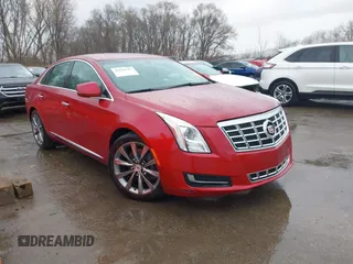 2013 Cadillac XTS z VIN 2G61N5S36D9129188, wystawiony jako IAAI lot #41824147 z przebiegiem 80 985 mil mil oraz . Historia ofert i sprzedaży dostępna na DreamBid. Obrazek 1.