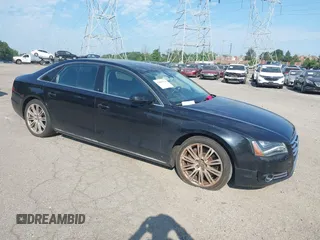 2011 Audi A8 z VIN WAURVAFD4BN020568, wystawiony jako IAAI lot #42865116 z przebiegiem 119 793 mil mil oraz . Historia ofert i sprzedaży dostępna na DreamBid. Obrazek 1.