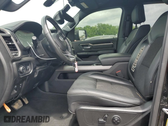2020 Ram 1500 Rebel with VIN 1C6SRFLT5LN408810, listed as a Copart auction lot 56894725 with 49,089 mi miles and Salvage title. Bid and sale history available at DreamBid. Image 7.