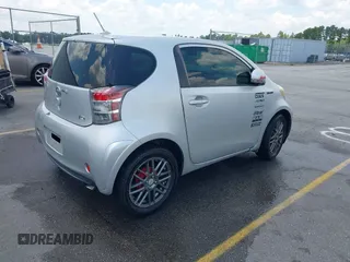 2013 Scion iQ with VIN JTNJJXB00DJ023345, listed as a IAAI auction lot 42631440 with 73,105 mi miles and . Bid and sale history available at DreamBid. Image 4.